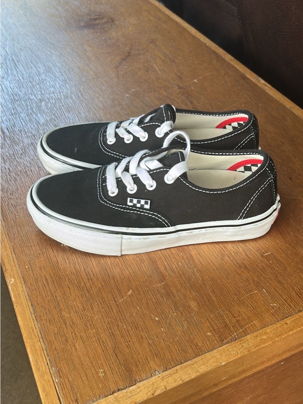 Vans woman’s size 6 Low-Top Black Canvas Sneakers with White Laces